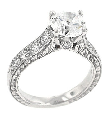 As you buy diamonds, this round shaped ring with amazing detail is a keeper